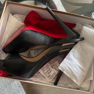 Wore these two times and touched up the bottom. Authentic from Neiman Marcus.